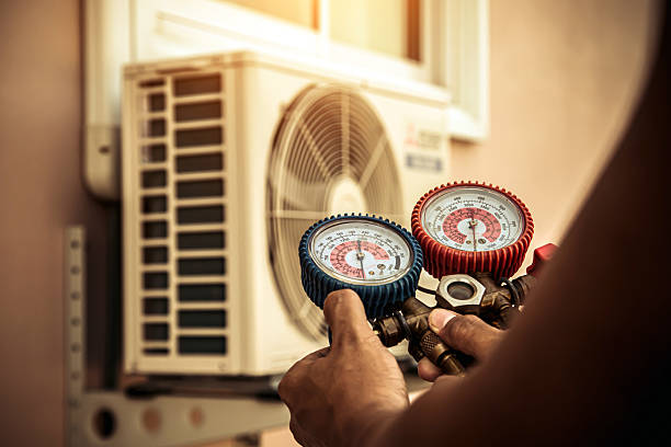 Professional Heat Pump Repair technician working in Perrysville, OH